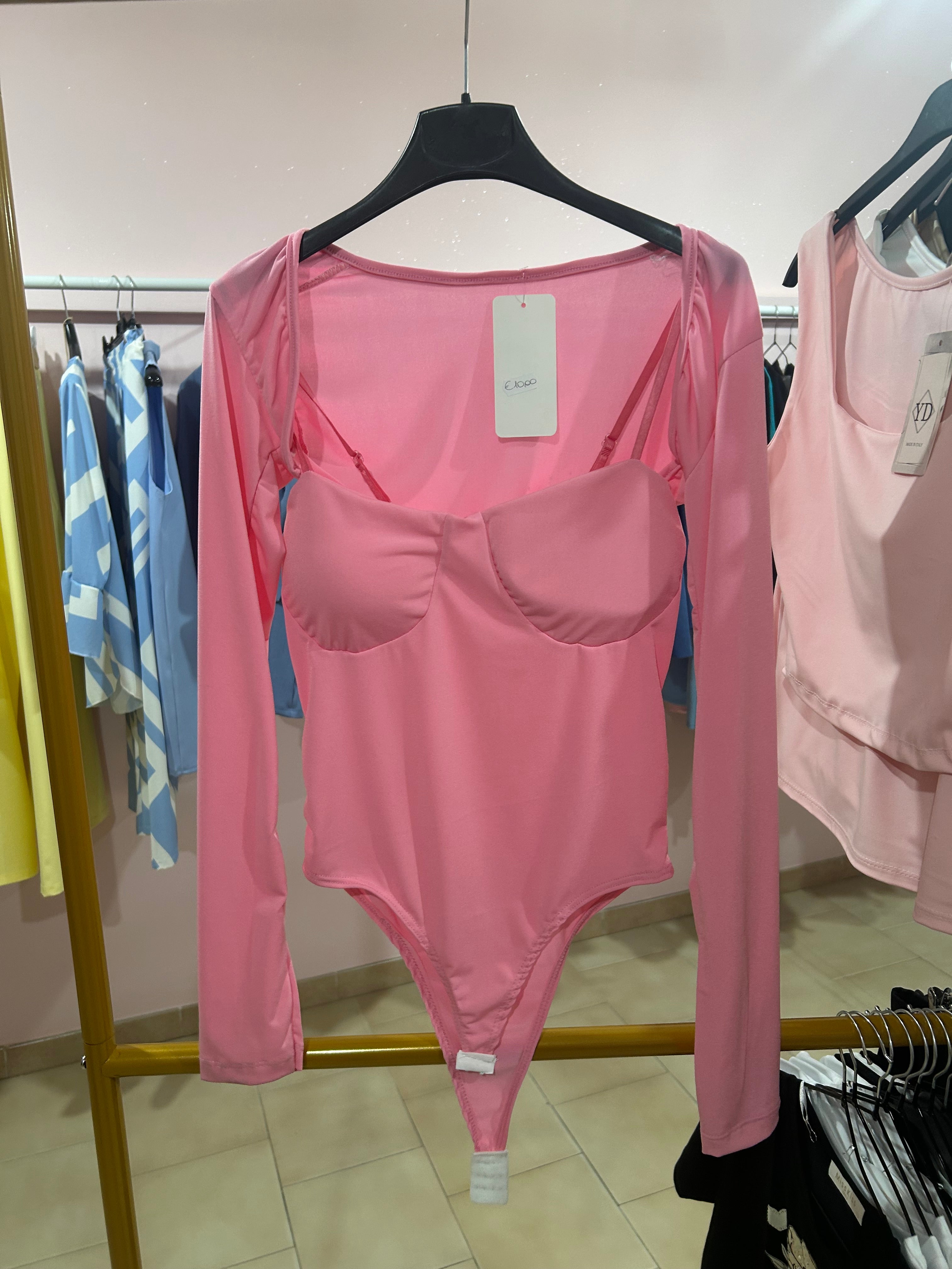 Top rosa con coprispalle